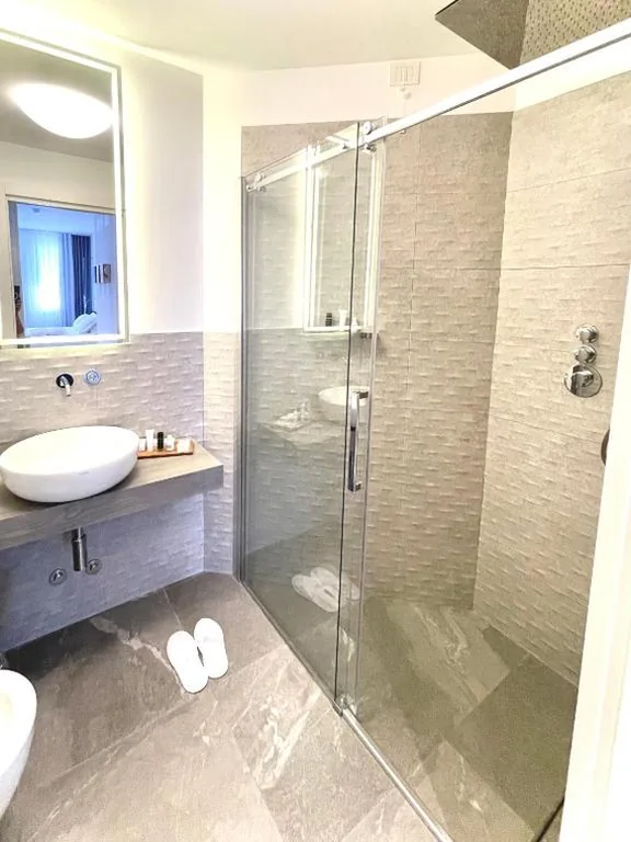 Superior Triple Room — Le Muraine