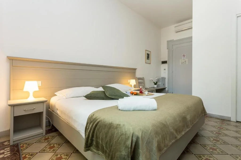 Superior Triple Room — The Leoncino Hotel