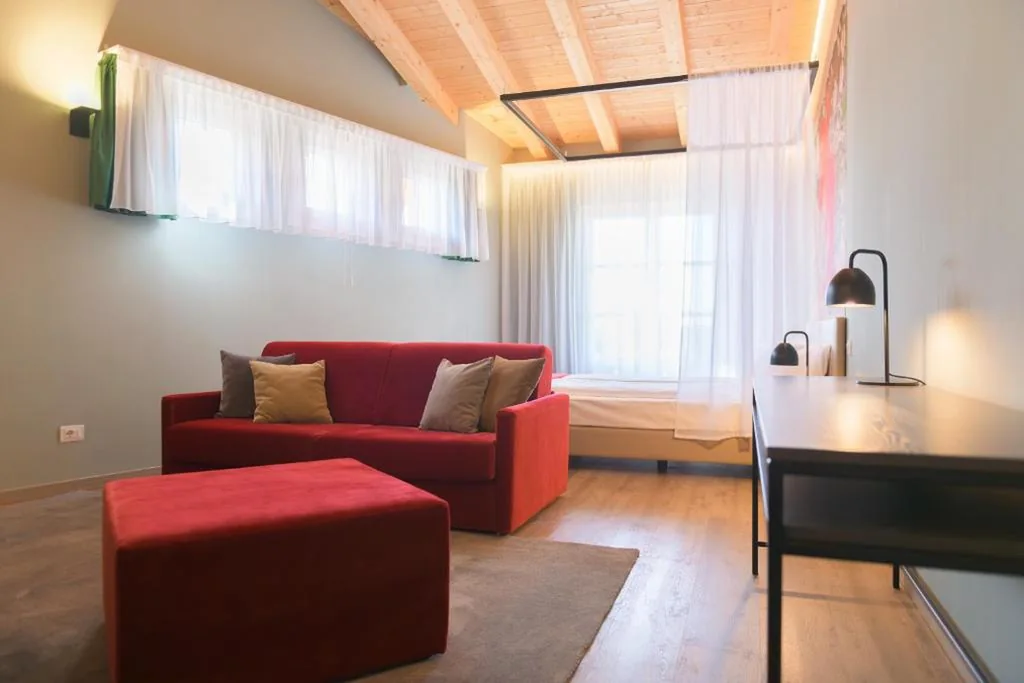 Junior Suite with Balcony — Regina del Garda Suite
