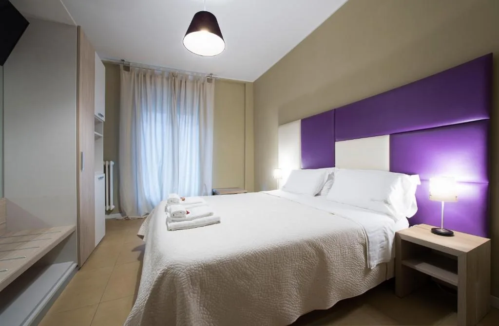 Junior Suite con Balcone — Tiffany Rooms