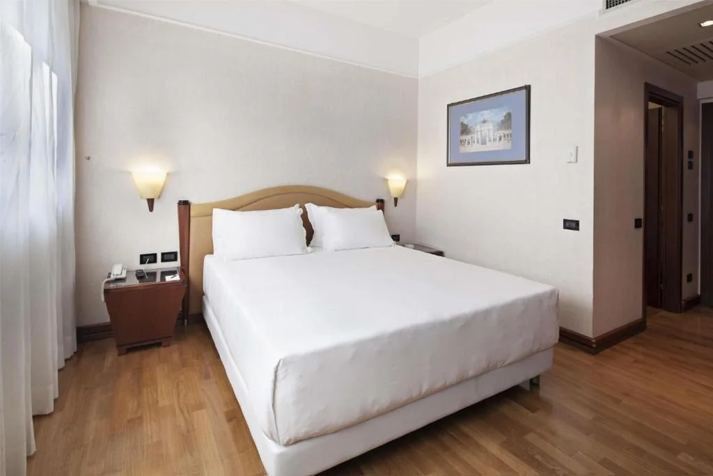 Junior Suite with Extra Bed (2 Adults + 1 Child) — NH Milano Machiavelli