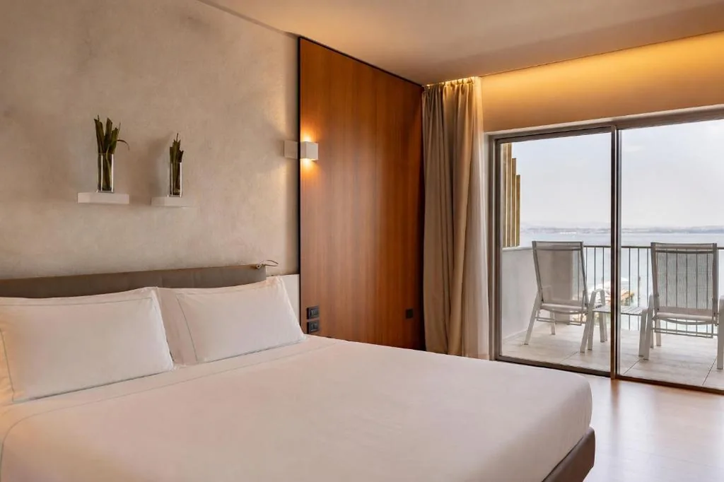 Junior Suite with Lake View and Spa Access — Hotel Ocelle Thermae & Spa – Adults Only