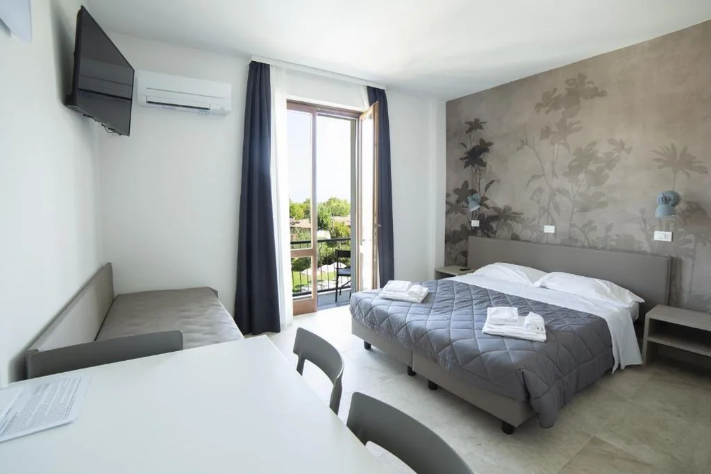 Junior Suite con Vista Lago — Residence Molino – Holiday Apartments