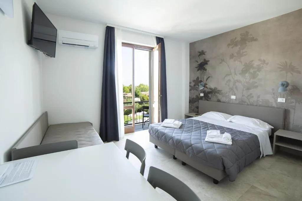 Junior Suite con Vista Piscina — Residence Molino – Holiday Apartments