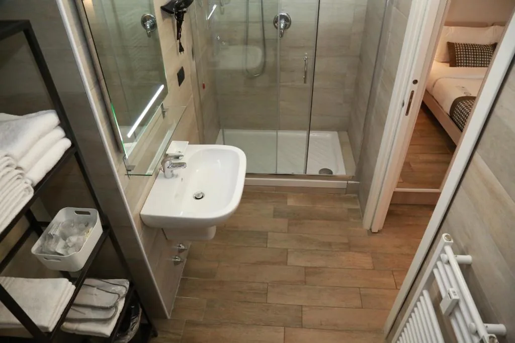 Family Studio (2 Adults + 2 Children) — Aparthotel Meneghino
