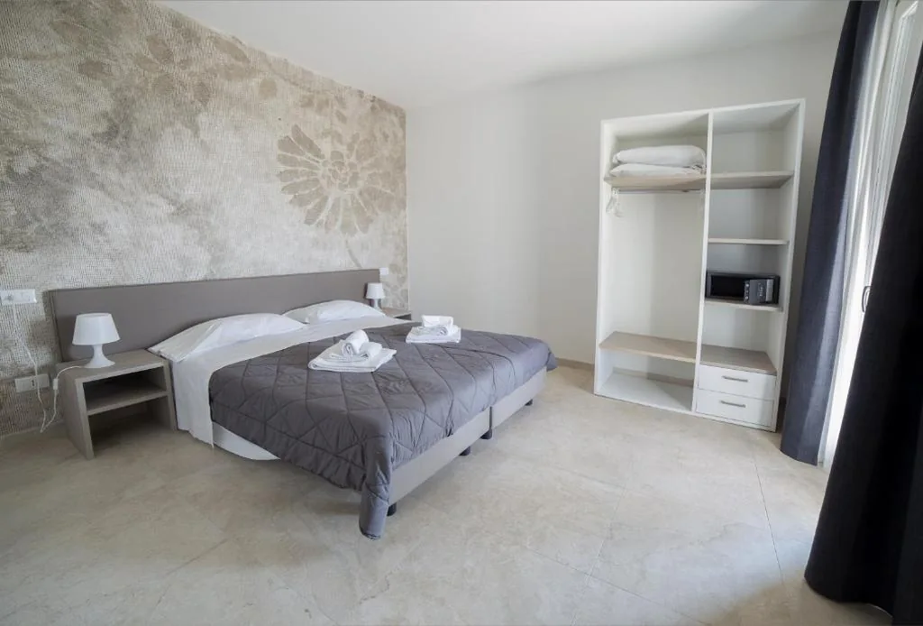 Suite con Balcone — Residence Molino – Holiday Apartments