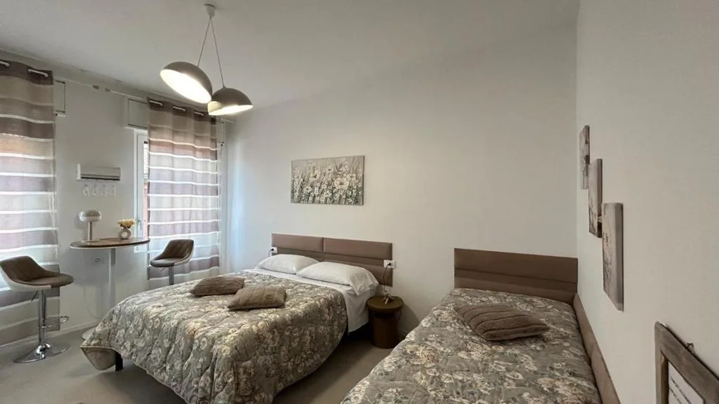 Suite con Vista Giardino — Comfort Accommodation Suite & Le Camere