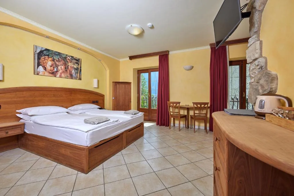 Suite con Vista Lago (4 Adulti) - Edificio Separato — Hotel Al Rio Se