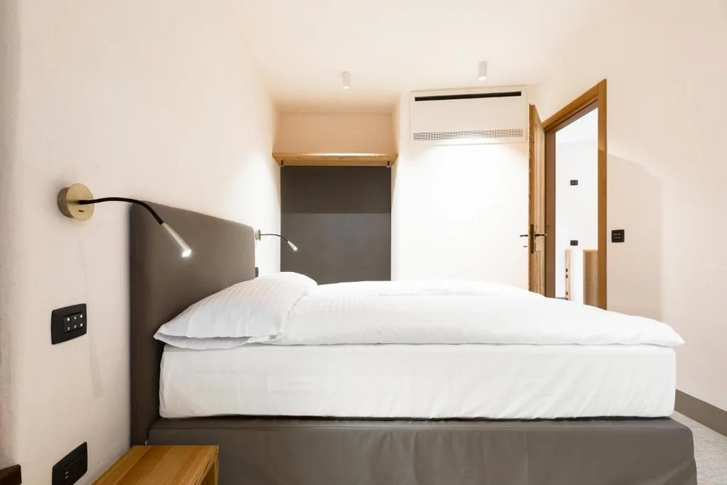 Suite con Vista Montagna — Curt di Clement Eco Mobility Hotel