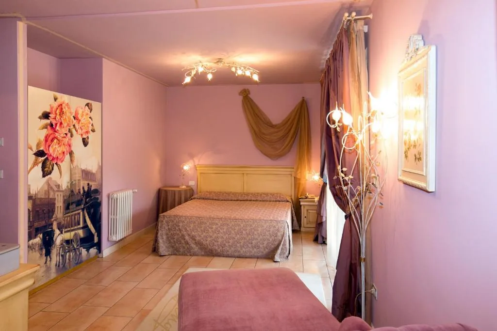 Deluxe Suite with Balcony — Hotel Serenella