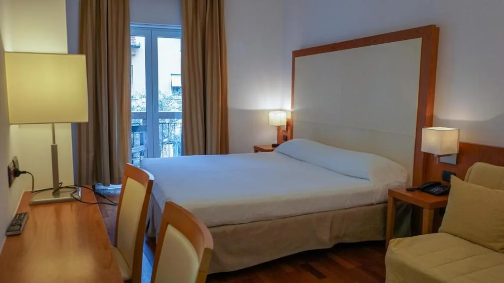 Interconnecting Family Suite with Balcony and City View — Hotel Mavino