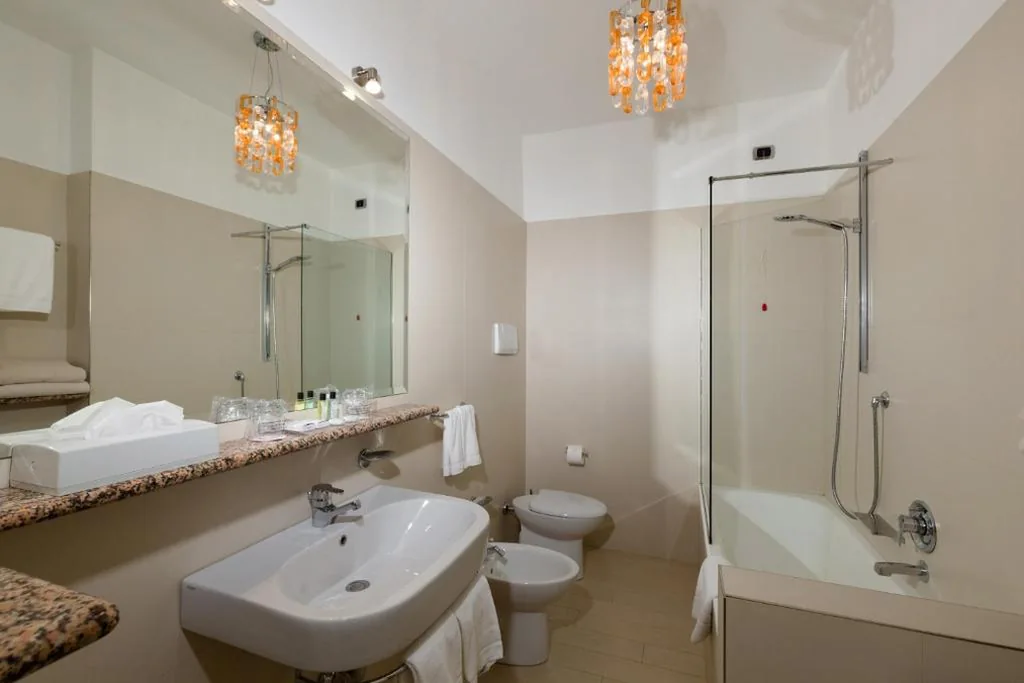 Family Suite with Partial Lake View and Spa Access — Hotel Continental Wellness & Spa