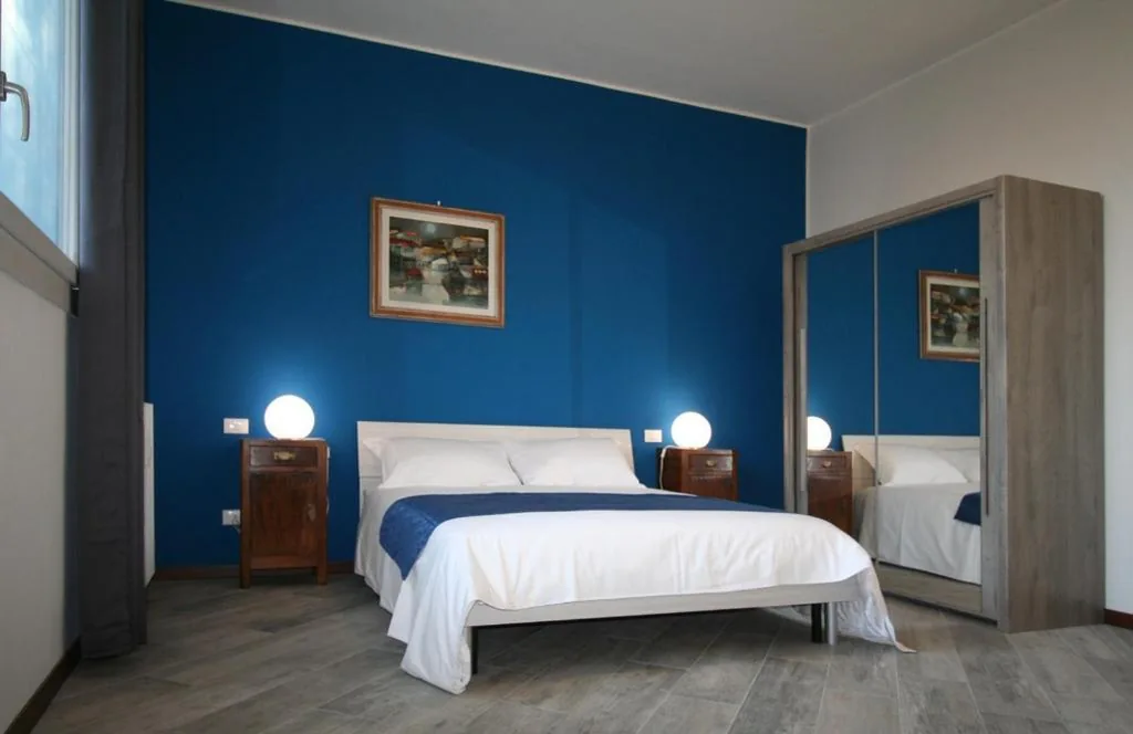 Deluxe Family Suite — SanSiroFiera Rooms