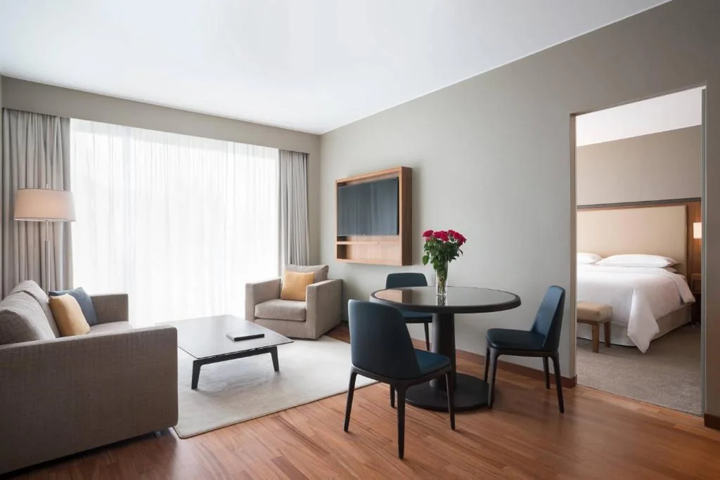 One-Bedroom King Suite with Sofa Bed and Balcony — Sheraton Lake Como Hotel