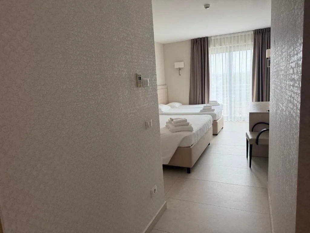 Superior Design Quadruple Room — Hotel Porto Azzurro