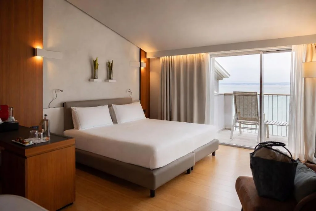 Wellness Junior Suite with Lake View and Spa Access — Hotel Ocelle Thermae & Spa – Adults Only