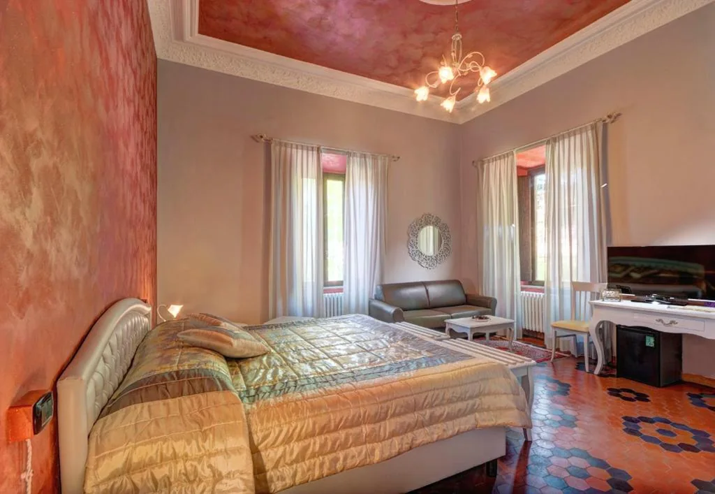 Deluxe Quadruple Room — Raffaello Residence una Dimora storica con piscina panoramica nelle Marche