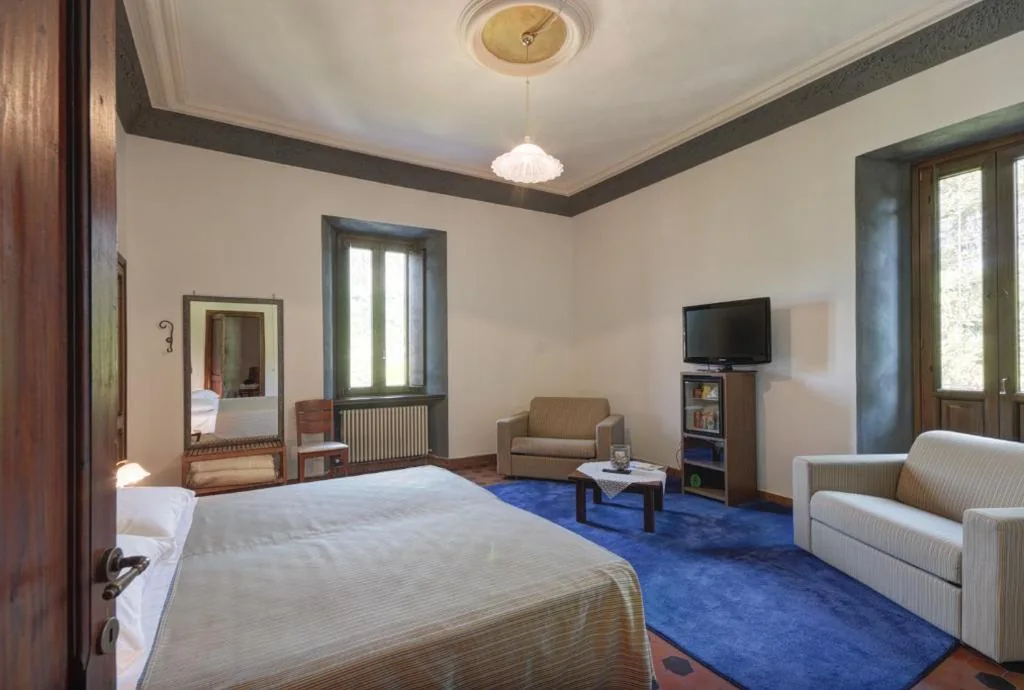 Superior Quadruple Room — Raffaello Residence una Dimora storica con piscina panoramica nelle Marche