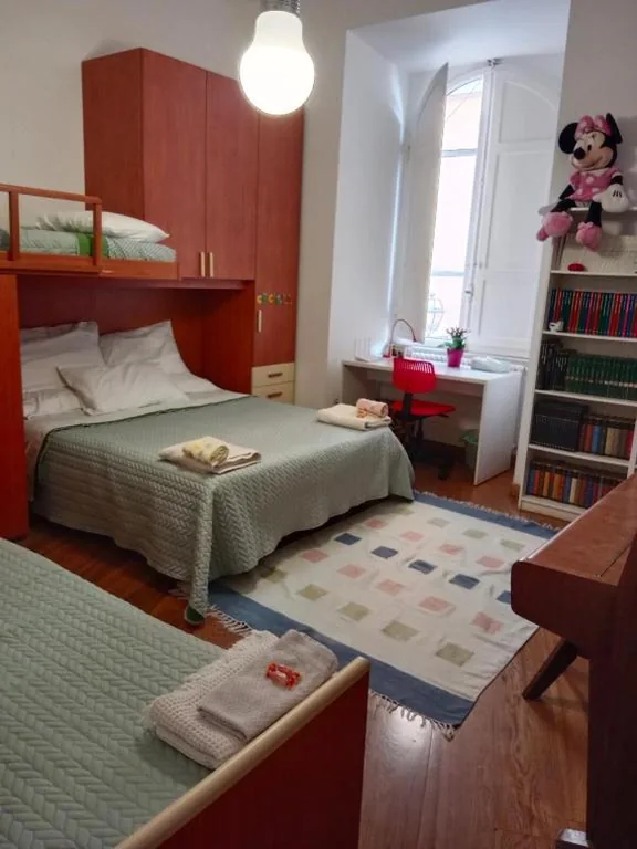 Private room by an Italian family – A unique experience close to Colosseum, the Roman Forum and Basilica Saint Mary Major — foto 7