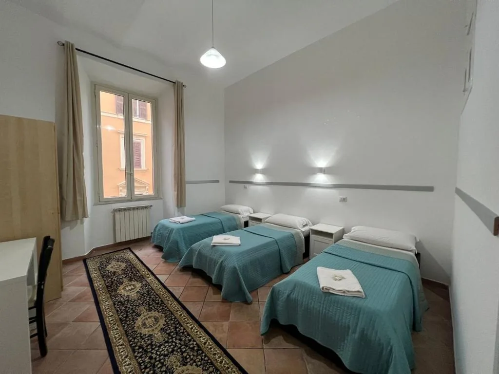 Quadruple Room with Outside Private Bathroom — Zidan Guest House