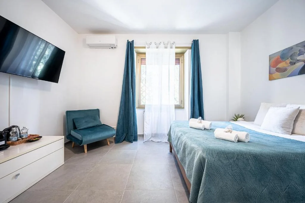 Roman Waves Room – 2 MIN Metro Marconi – 15 MIN Colosseo – A-C & WIFI — foto 4