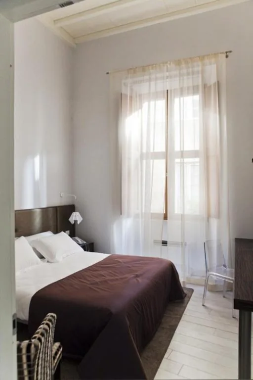 Suite (4 Adulti) — Trevi Palace Luxury Inn