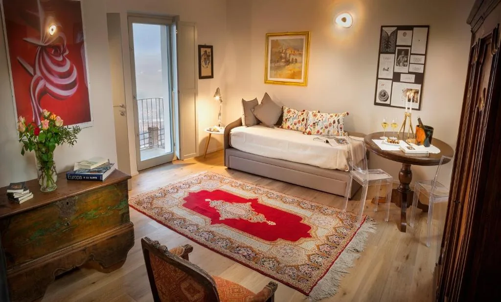 Suite con Balcone — Borgese Camere e Suites