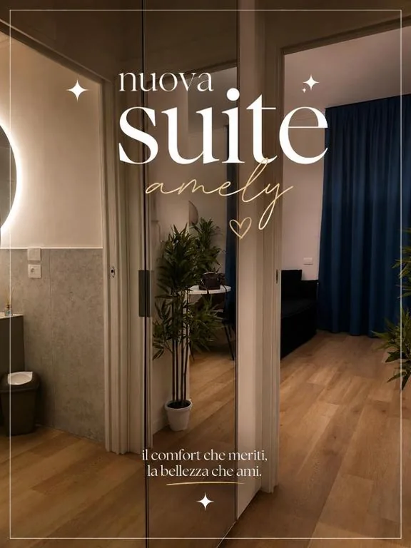Suite con Balcone — Camere Amely