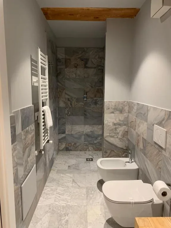Suite with Sauna and Hot Tub — Aux Pieds du Roi – Suite & Spa