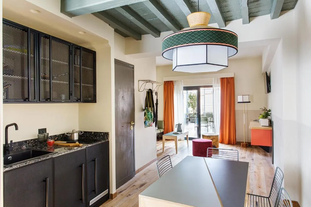Suite con Terrazza — Condominio Monti Boutique Hotel