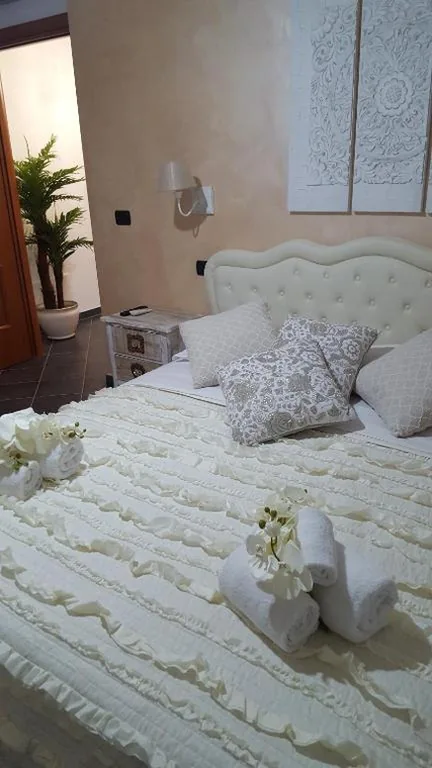 Suite con Terrazza — Giramondo Guest house