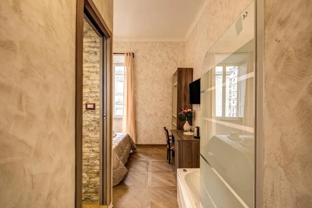 Suite with Hot Tub — AMICI GUESTHOUSE
