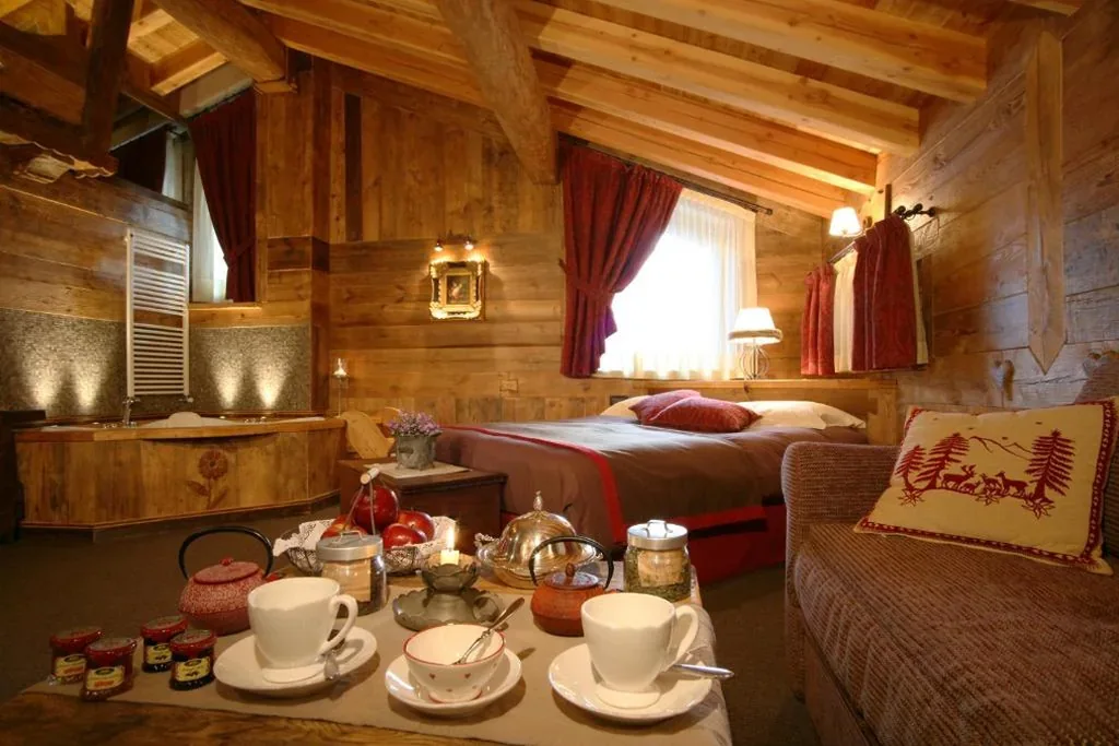 Suite con Vasca Idromassaggio — Hotel Letterario Locanda Collomb