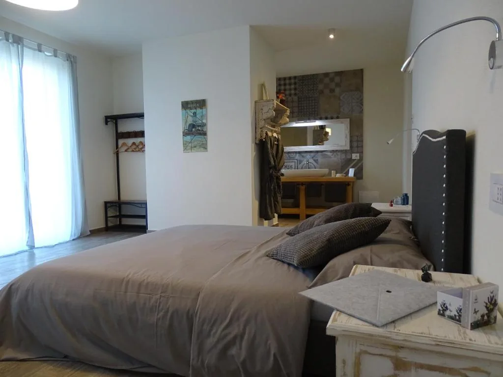 Suite Deluxe — Al Tirabusòn Country House
