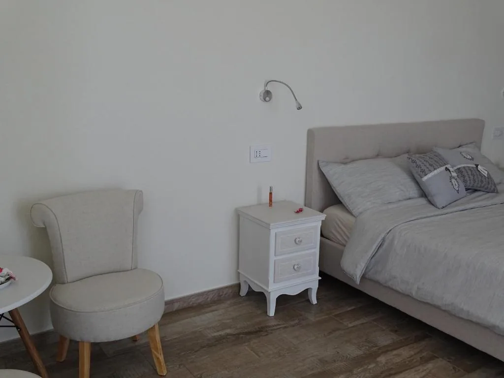 Suite Deluxe — Al Tirabusòn Country House
