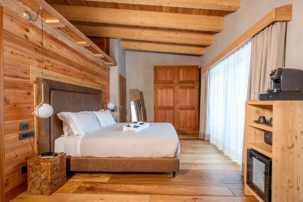 Suite Deluxe — Au Charmant Petit Lac – Ecohotel Parc & Spa