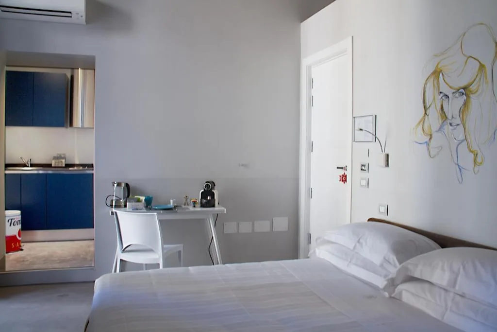 Deluxe Suite with Balcony — Piazza Castello Suite
