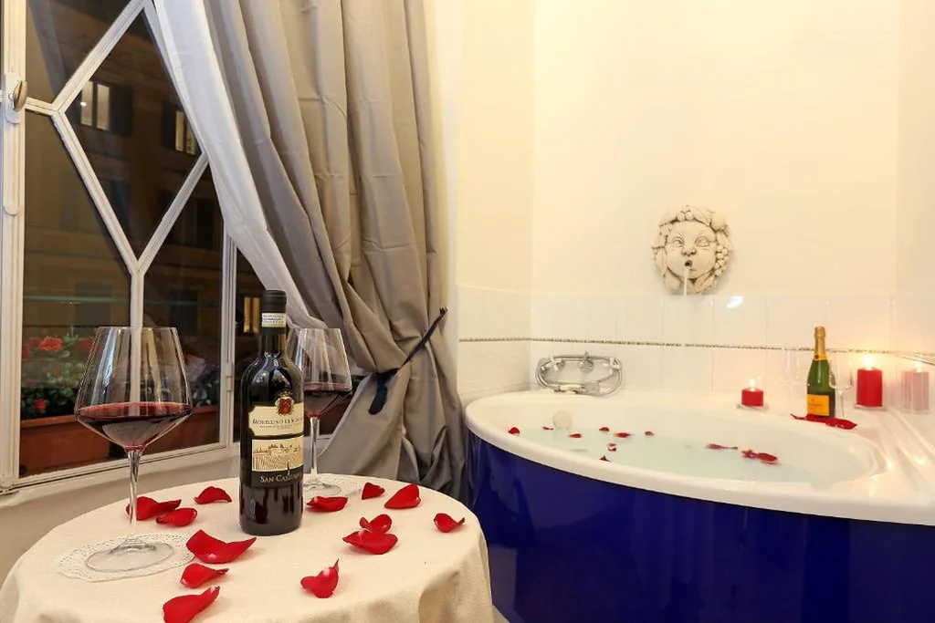Deluxe Suite with Whirlpool Tub — Grand Tour Rome Suites – Liberty Collection