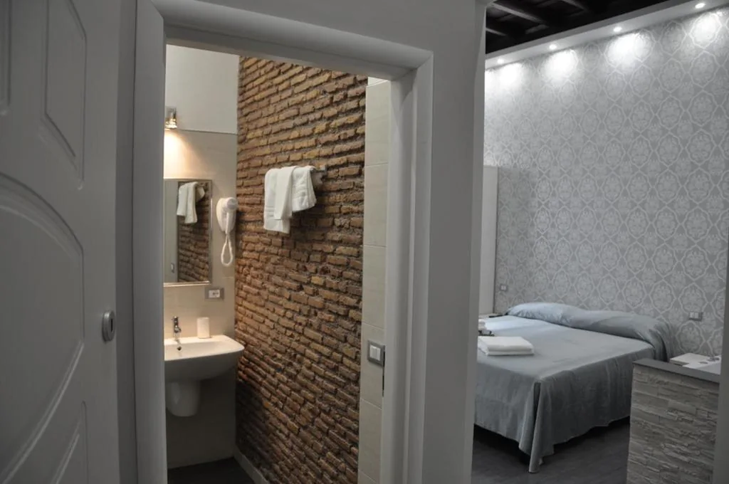 Suite Deluxe con Vasca Idromassaggio — Imperial Relais