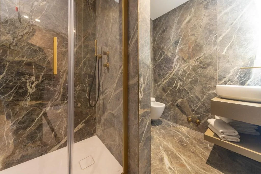 Suite Deluxe con Vasca Idromassaggio — San Carlo Suite