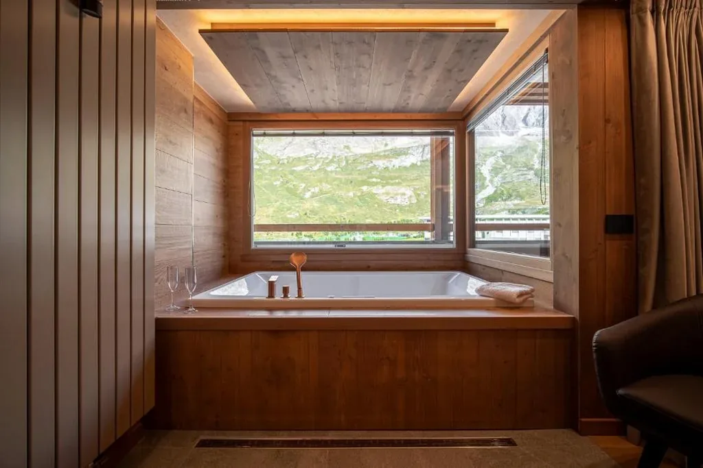 Suite Deluxe con Vasca Idromassaggio — Sertorelli Sporthotel