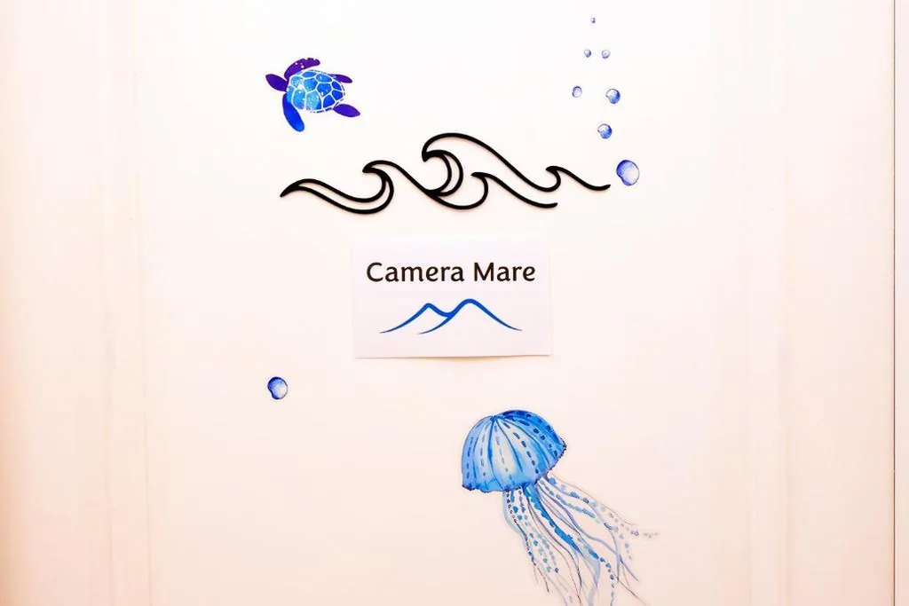 Deluxe Suite with Sea View — Mare e Monti