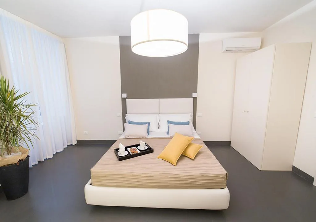Appartamento con 2 Camere da Letto - Dependance — LUCUS Exclusive Bed and Breakfast
