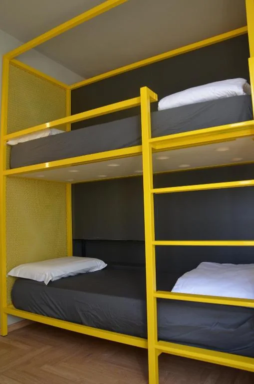 Room with Three Bunk Beds — RE Versiliana Junior-House