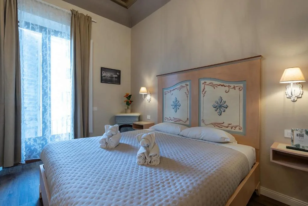 Camera Deluxe (2 Adulti + 1 Bambino) — Sweet Home XX Settembre