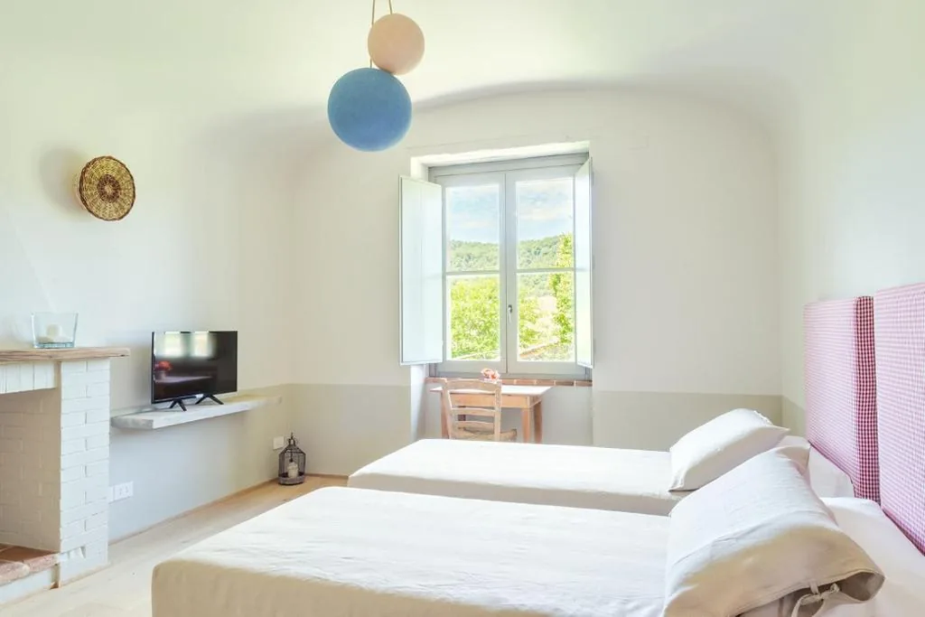 Camera Deluxe Matrimoniale/Doppia con Letti Singoli — CUGUSI BnB