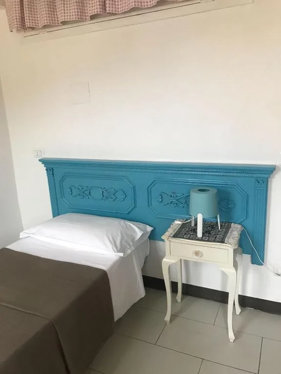 Twin Room with Shared Bathroom — Mavi’s bedrooms
