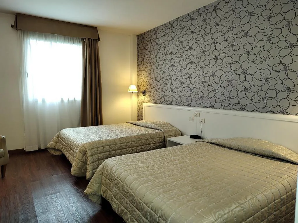 Twin Room — Hotel Datini