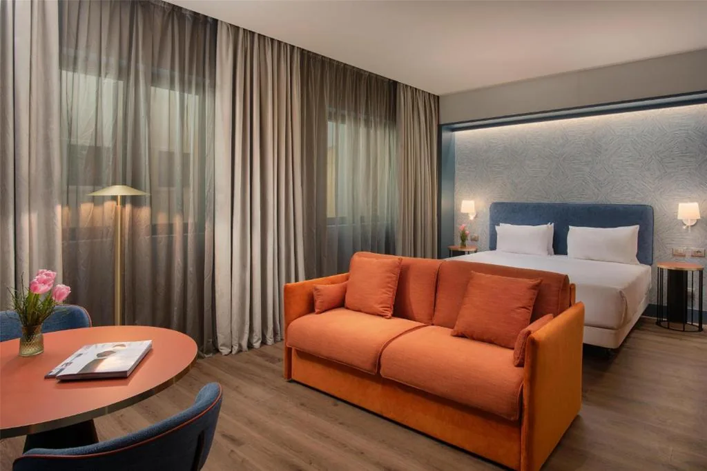 Camera Familiare con Letto Extra (2 Adulti + 2 Bambini) — NH Firenze