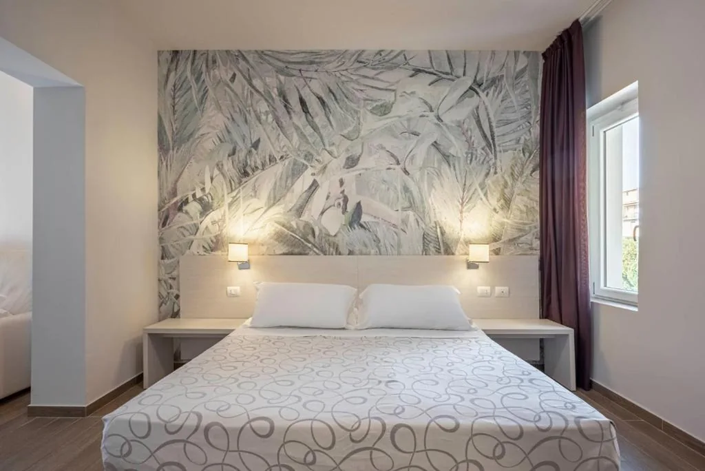 Family Room with Pine Forest View — Hotel La Pineta